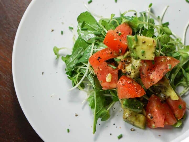 Quick, Easy and Nutritious Salad: Tomato and Avo on Arugula and Micro Greens