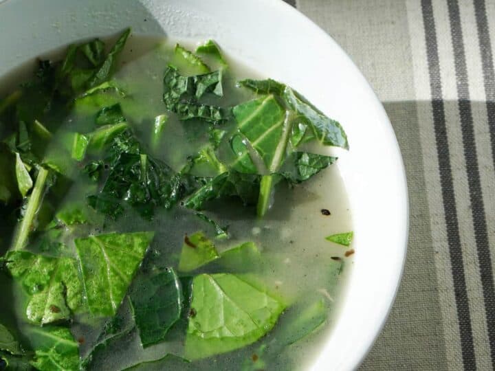 Try this nourishing bone broth over winter greens recipe is a quick and healthy meal that will reset your body after overindulging. Healthy + Delicious