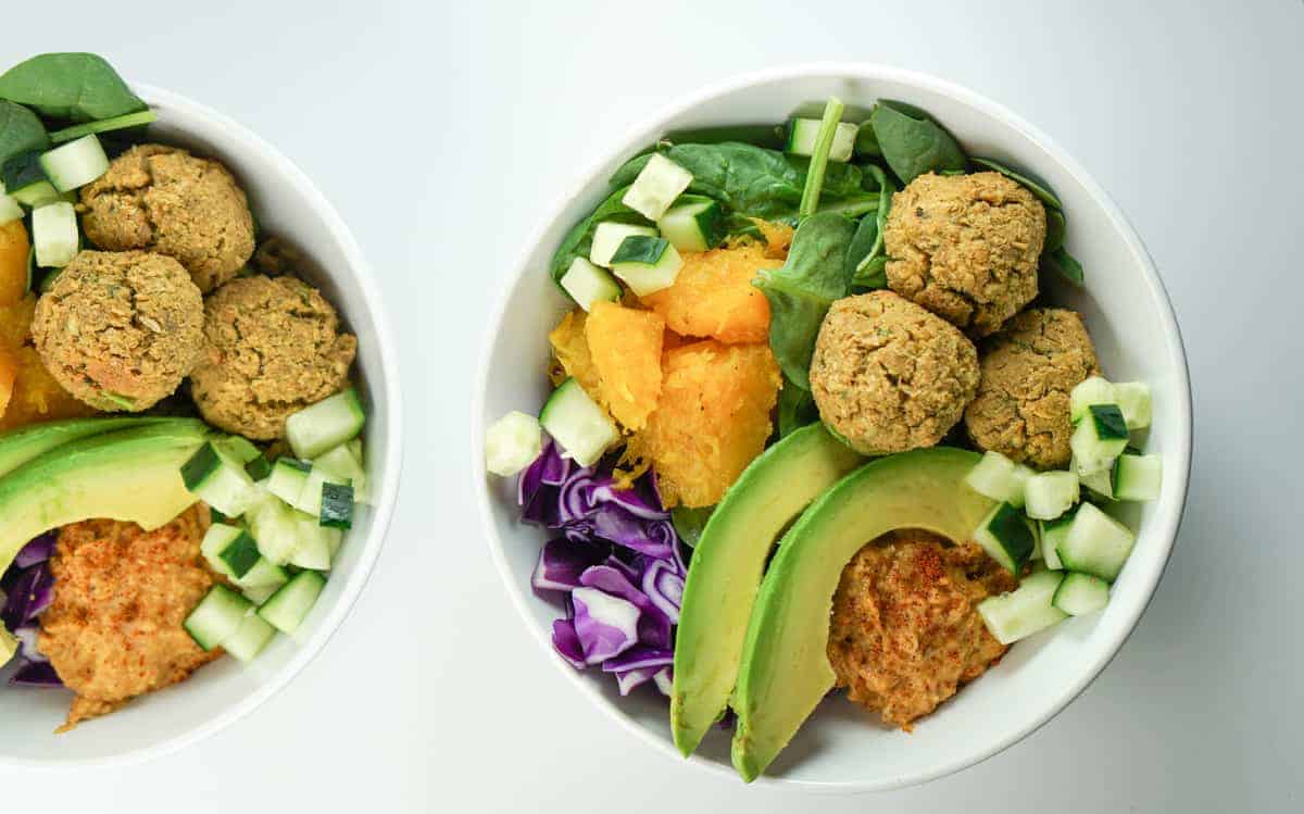 Quick, fresh and Easy falafel bowls with roasted squash, avocado and harissa hummus recipe. A perfect healthy dinner. Absolutely delish and satisfying.