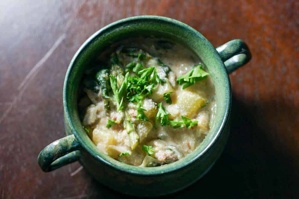 This healthy Greek Lemon Hummus Soup Recipe is a healthy, vegetable rich soup. It's super quick and easy and a great way to use leftovers. gluten free, dairy free, sugar free, paleo