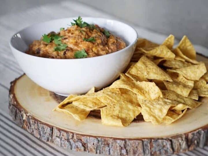 Healthy Creamy Chip Dip Recipe: A creamy savory chip dip that's sure to be a crowd pleaser. They'll never know that its healthy and has no cheese! Ground beef, hummus, salsa and spices.