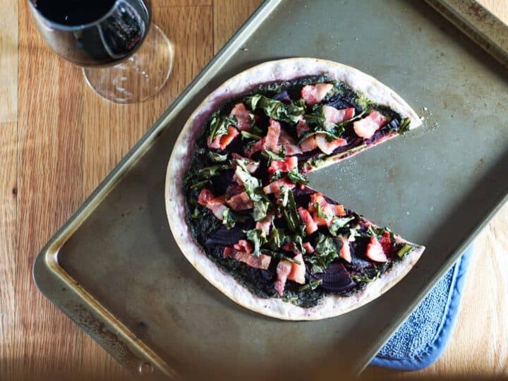 The healthiest pizza on earth. This gluten free, dairy free Beet and Dandelion Flatbread Recipe is chocked full of detoxing nutrients. Perfect spring meal.