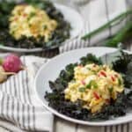 A cleaned up and simple 5 ingredient Egg Salad Kale Wraps recipe: pasture raised eggs, paleo mayo, fresh radishes and green onions all wrapped in Red Kale