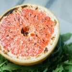 This brûléed grapefruit recipe showcases caramelized sugars without added refined sugars and cream. Add tossed arugula for a paleo, whole 30, GF, DF lunch.