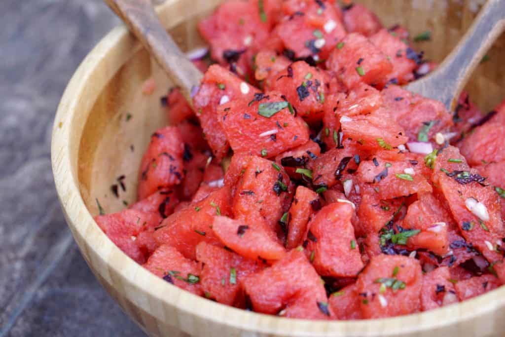 Fresh garden herbs and juicy watermelon make this savory watermelon basil salad recipe a perfect side dish for hot summer days. Dairy, Grain, Gluten Free + Vegan