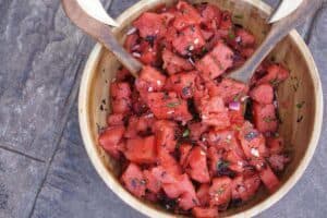 Fresh garden herbs and juicy watermelon make this savory watermelon basil salad recipe a perfect side dish for hot summer days. Dairy, Grain, Gluten Free + Vegan