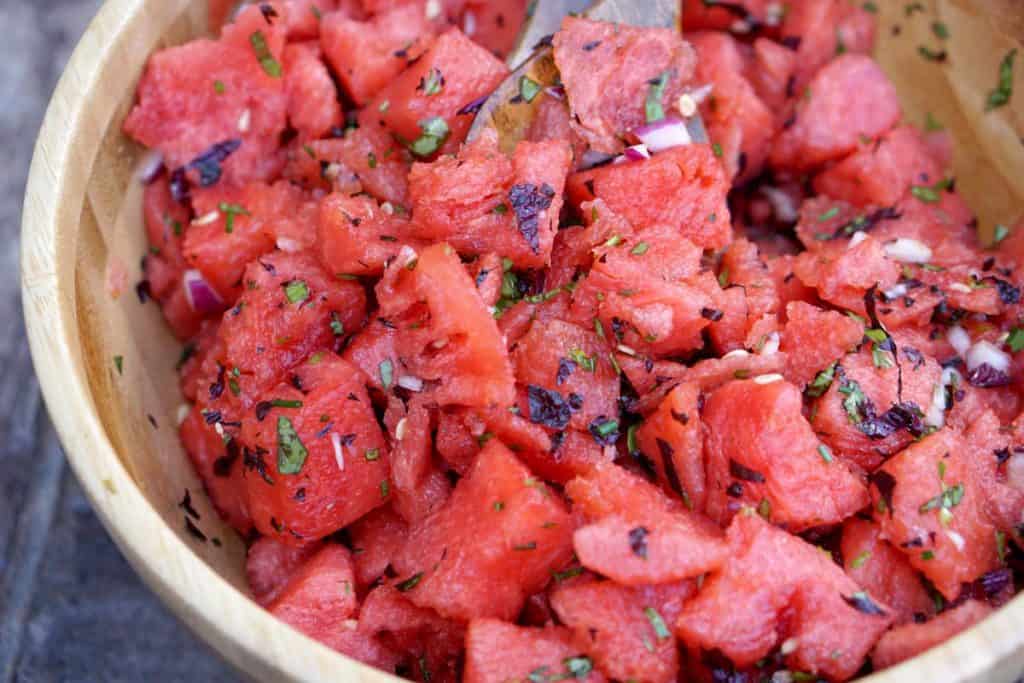 Fresh garden herbs and juicy watermelon make this savory watermelon basil salad recipe a perfect side dish for hot summer days. Dairy, Grain, Gluten Free + Vegan