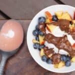 Fresh berries, creamy coconut ice cream, healthy magic shell make this great dairy free coconut berry sundae with homemade peanut butter chocolate drizzle