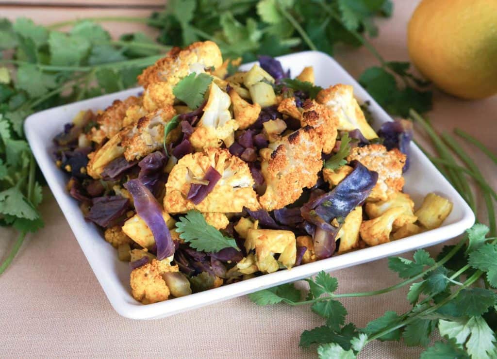 This easy and hearty AIP friendly Turmeric Cauliflower Bake Recipe is the perfect new staple for your paleo, grain free, and gluten free lifestyle.