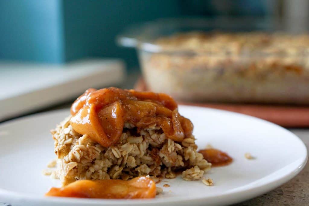 This easy egg alternative will save time in the mornings. Gluten free, dairy free, refined sugar free, paleo and vegan healthy baked oatmeal made with peaches and rhubarb recipe with just enough cinnamon and nutmeg.