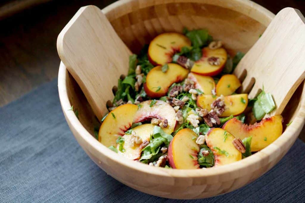 Fresh tossed peach, pecan, basil cucumber salad merges summer and fall flavors - gluten, dairy, sugar, soy, corn free
