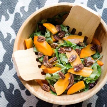 This quick salad is ready in minutes and brings some freshness to classically fall flavors. Just mix persimmons, arugula, toasted pecans and spice together for a naturally paleo and gluten free salad.