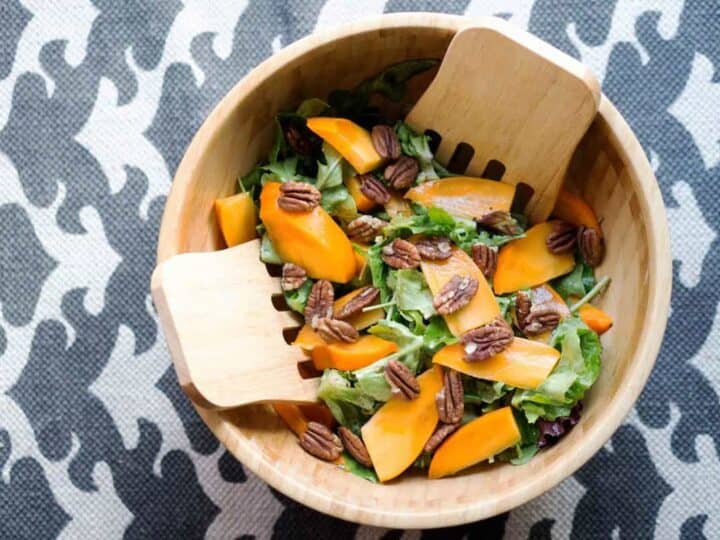 This quick salad is ready in minutes and brings some freshness to classically fall flavors. Just mix persimmons, arugula, toasted pecans and spice together for a naturally paleo and gluten free salad.