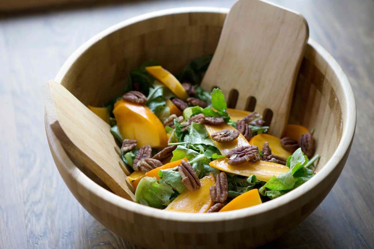 This quick salad is ready in minutes and brings some freshness to classically fall flavors. Just mix persimmons, arugula, toasted pecans and spice together for a naturally paleo and gluten free salad.