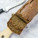 sliced gluten free zucchini bread with knife