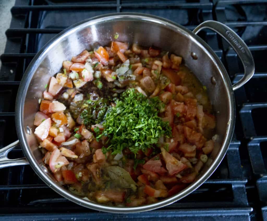 Adding fresh herbs to the cucumber ratatouille (2)