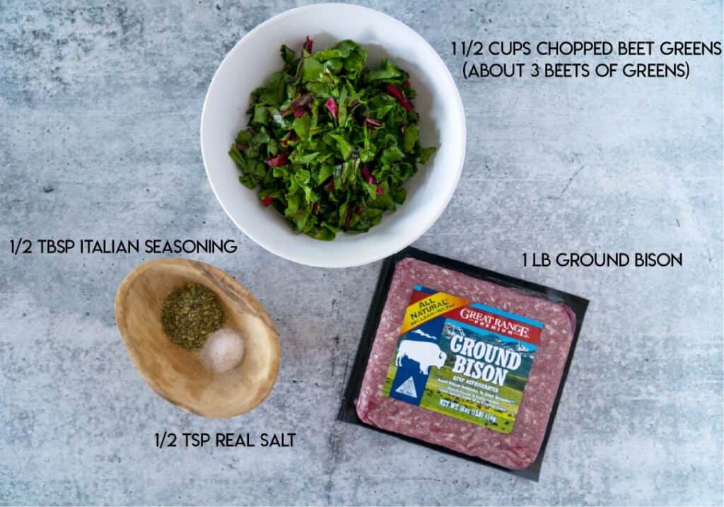 Meatball ingredients: bowl of beet greens, another bowl of italian seasoning and salt, package of ground bison