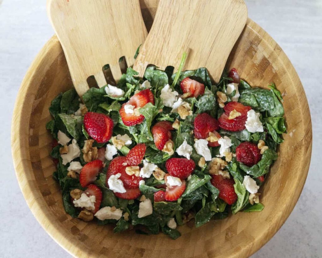 Strawberry Spinach Salad in wooden salad bowl